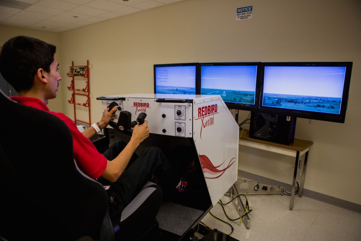 a student practicing in the simulator