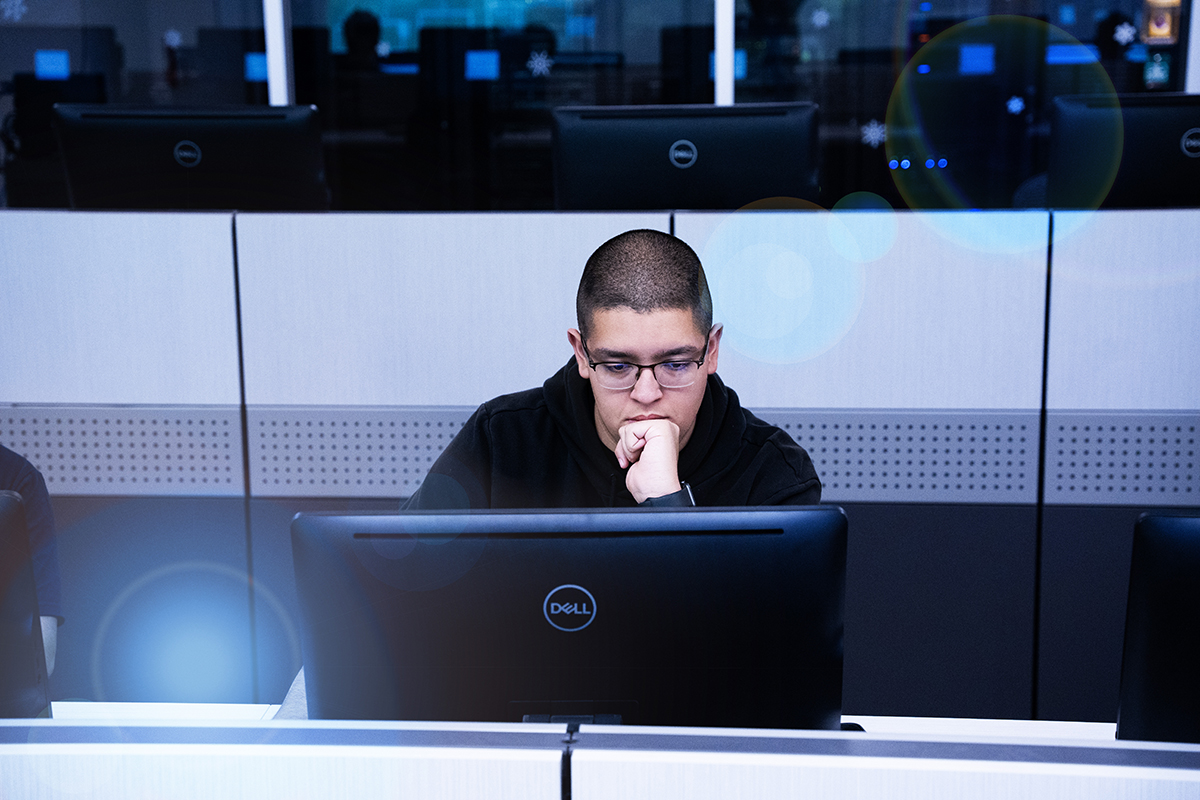 CIS student at computer