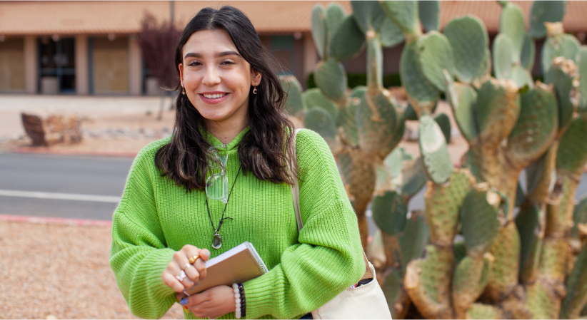 student in green