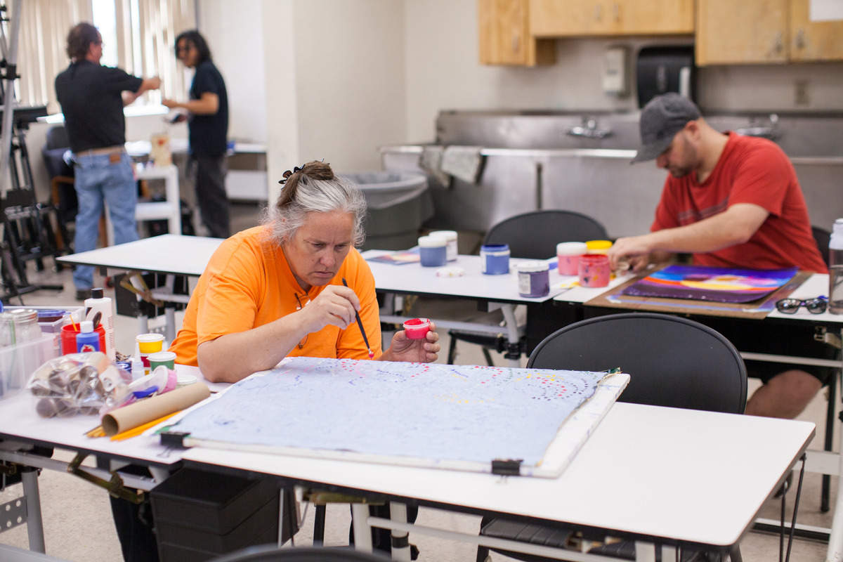 Two Students Working on Art Projects