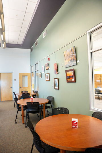 Tables in lobby of Benson Center