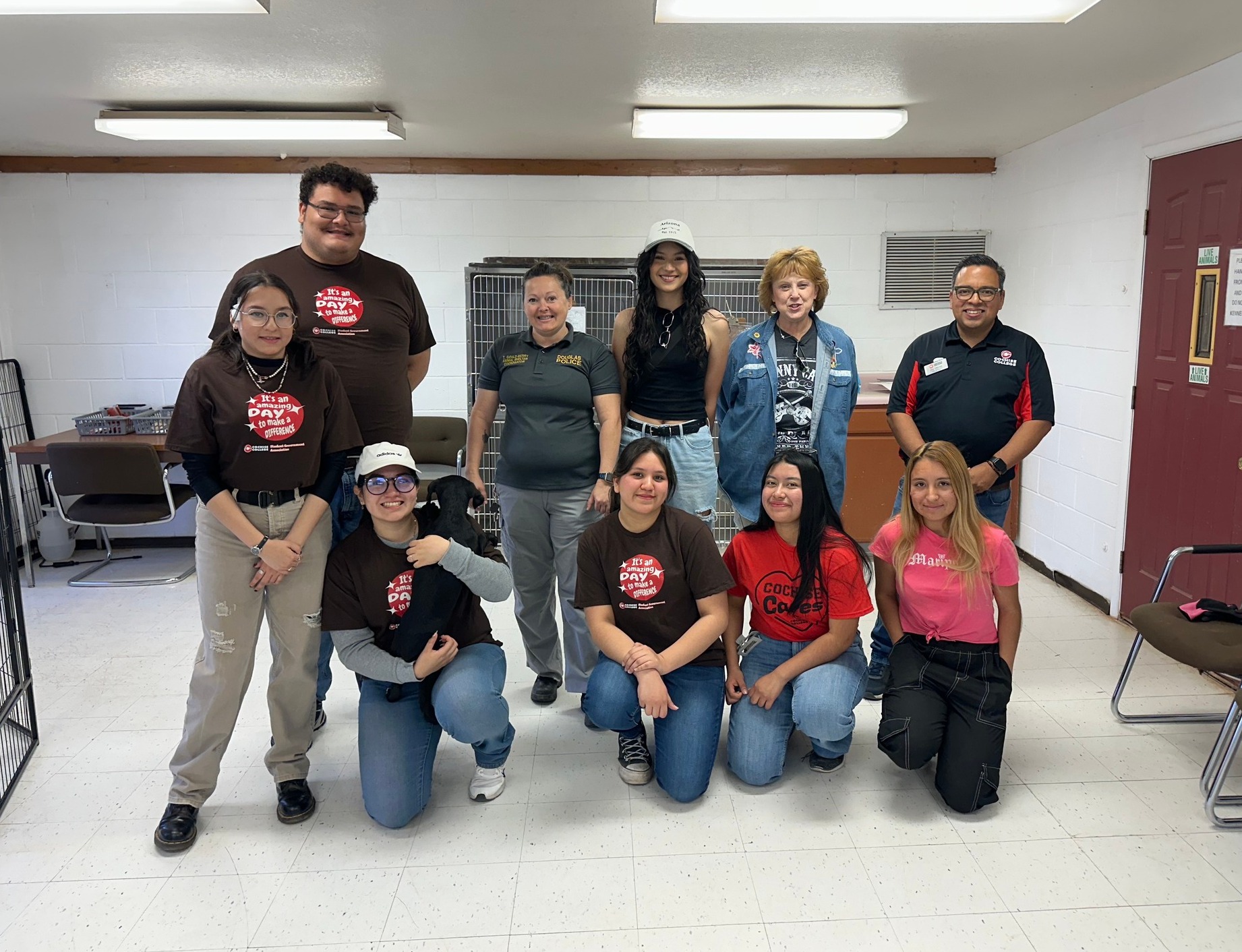 Front entrance to new building. Modern architecture with glass doors and tall windows.