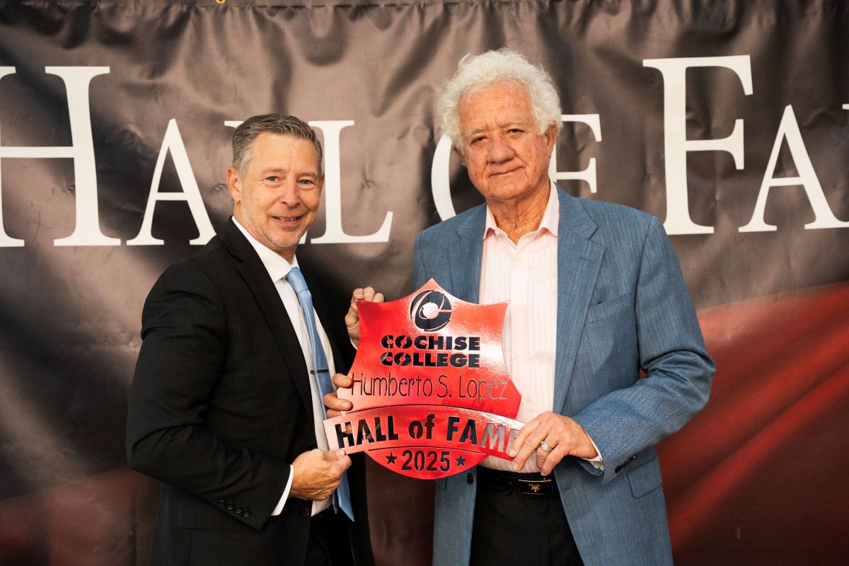 Humberto Lopez and Dr. James Perey posing at the 2026 Cochise College Hall of Fame ceremony.